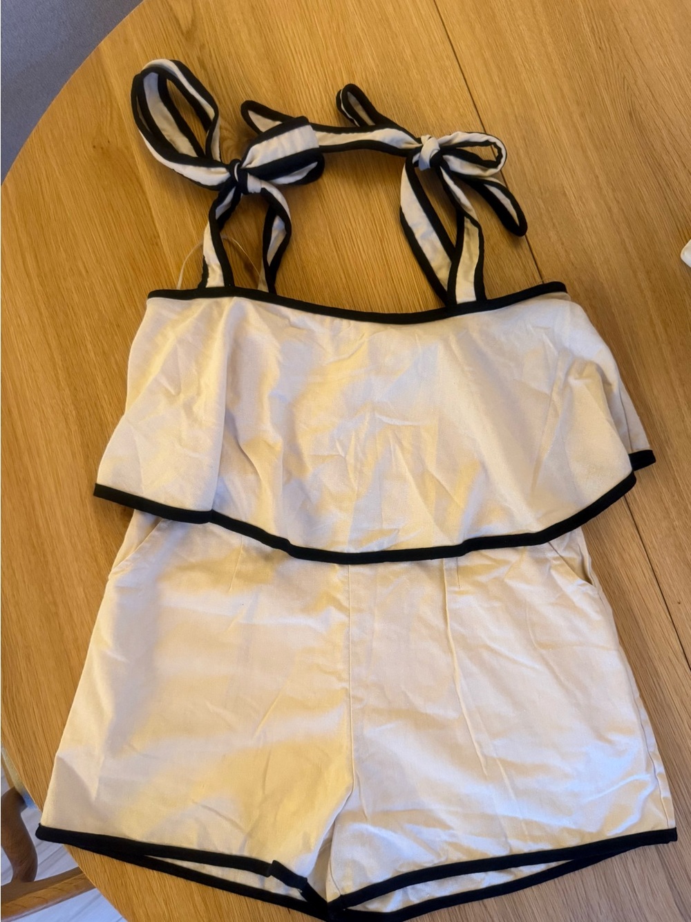 Women’s White Romper with Black Trim and Tie-Shoulder Straps